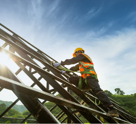 New gutter system installation on craftsman-style home